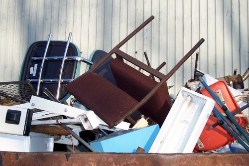Inspector reviewing labour conditions at a garden clearance site