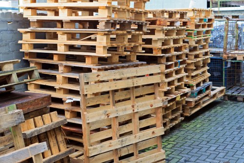 Van being loaded with garden waste on a Willesden street